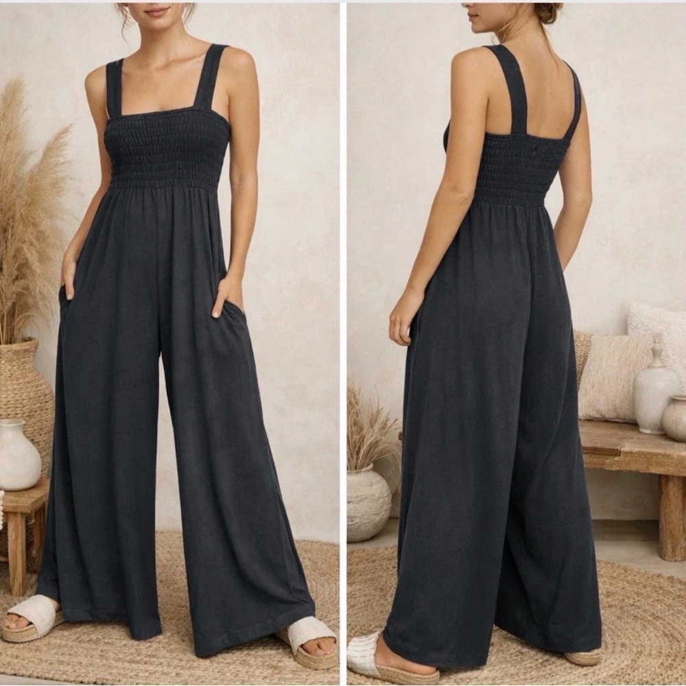 Free People Beach Smocked Homecoming Wide Leg Jumpsuit in Dark Charcoal Grey